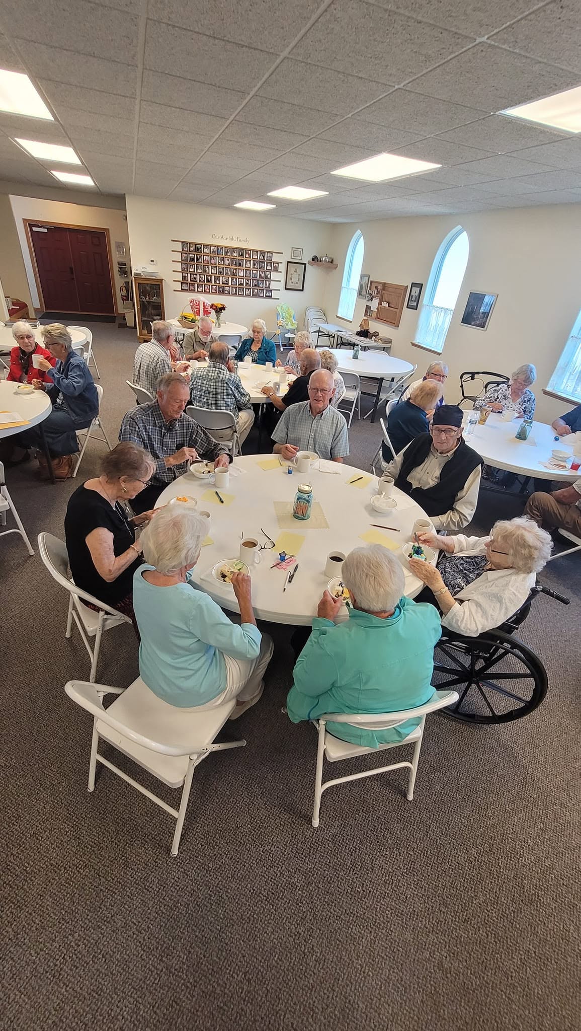 Aardahl church members seated at a round table